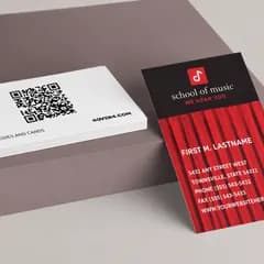 School of music free business card beside a stack of QR code backs